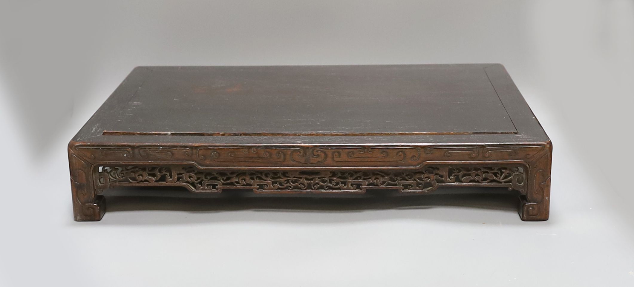 A 19th century Chinese hongmu low stand - 51cm long